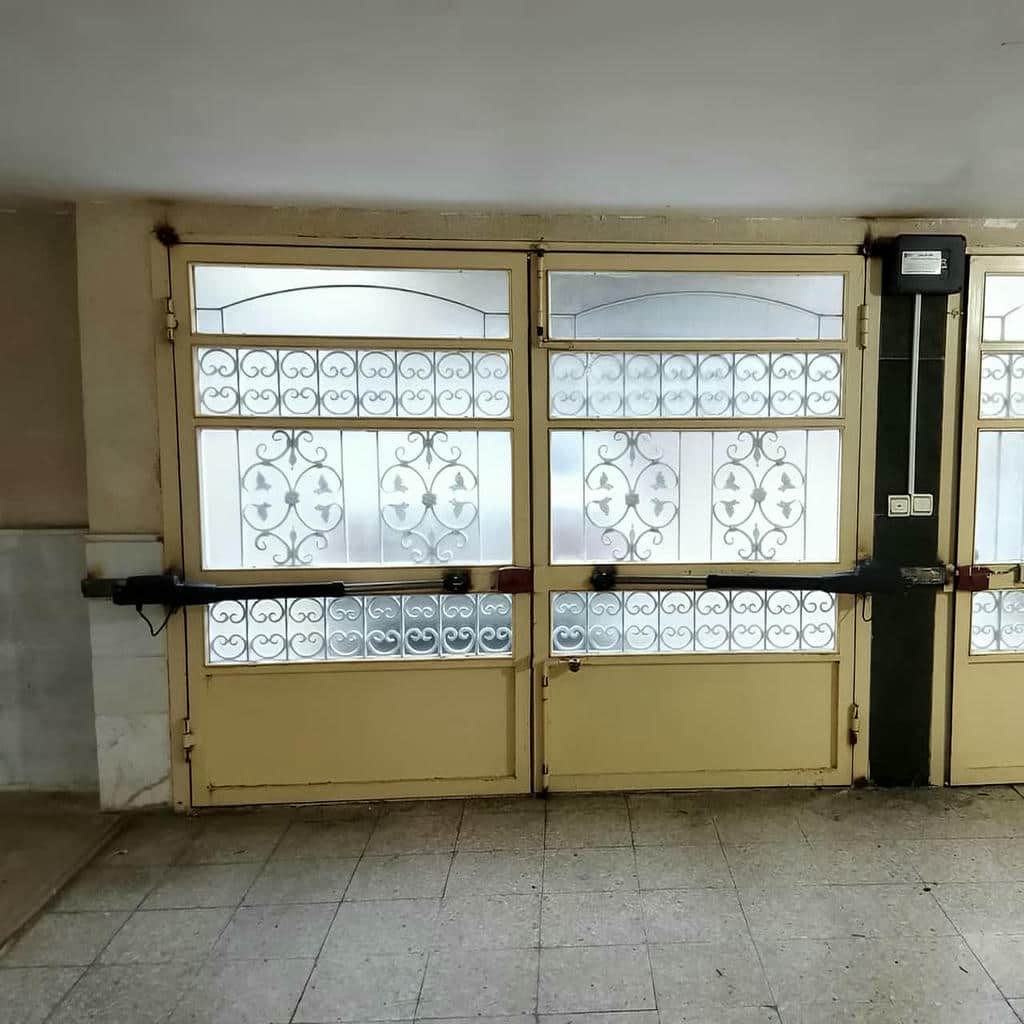 خرید جک درب پارکینگ دولنگه در سیرجان