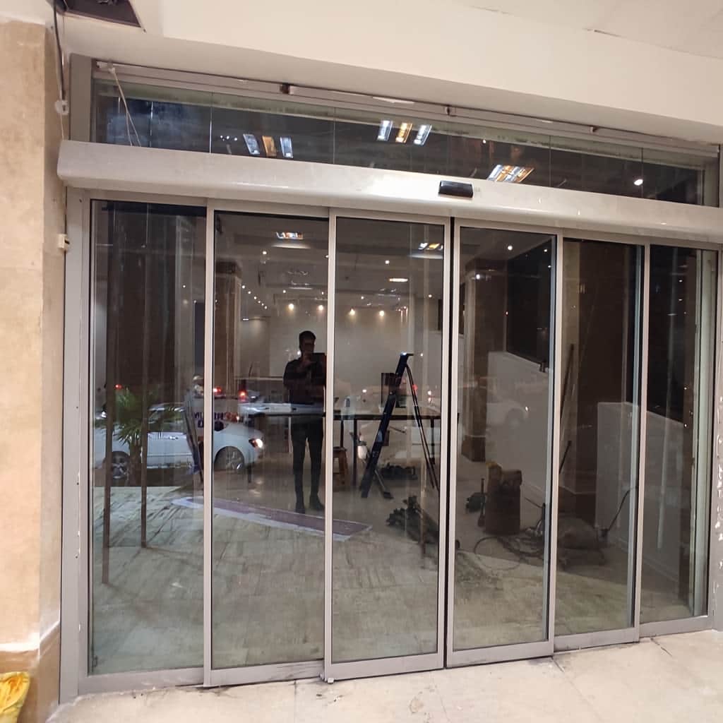 درب اتوماتیک تلسکوپی با شیشه لمینت