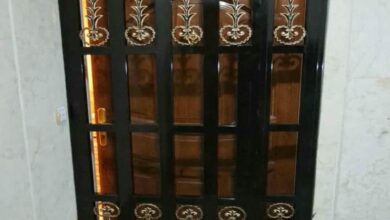 حفاظ کرکره ای فلزی با پوشش رنگی هماهنگ با نمای ساختمان