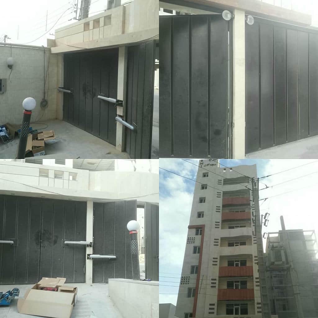 موتور درب پارکینگ کنار جک ریلی درب کشویی
